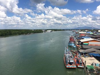 High angle view of harbor by sea against sky