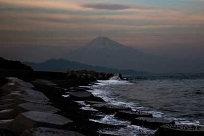 Scenic view of sea against sky during sunset