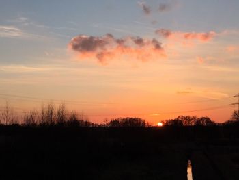 Scenic view of landscape at sunset