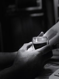 Close-up of hands holding tea