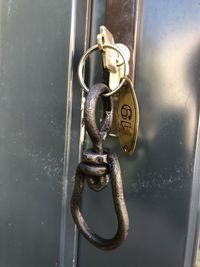Close-up of chain hanging on door