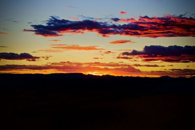 Scenic view of dramatic sky during sunset