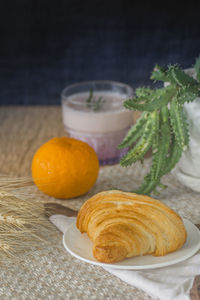 Close-up of orange fruit on table