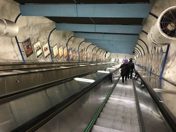 People in subway tunnel