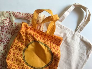 High angle view of bags on white background