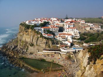 High angle view of town by sea