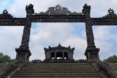 Low angle view on entrance gate to the khai dinh royal tomb in hue, vietnam