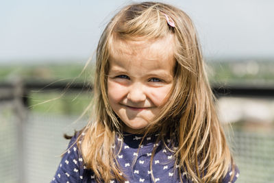 Close-up portrait of smiling girl