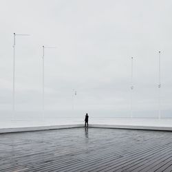 Full length of man in sea against sky