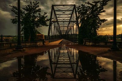 View of bridge against cloudy sky