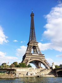 Eiffel tower against blue sky