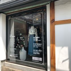 Text on glass window at store