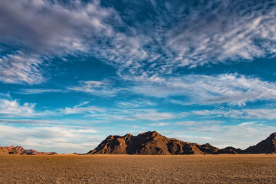 Scenic view of desert against sky