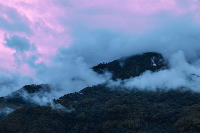 Scenic view of volcanic mountain against sky