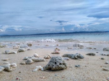 Scenic view of beach against sky