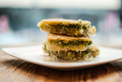 Close-up of sweet food served in plate on wooden table