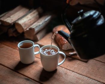 Close-up of coffee cup on table