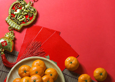 Directly above shot of orange fruits on table