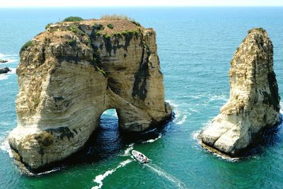 Scenic view of sea against blue sky