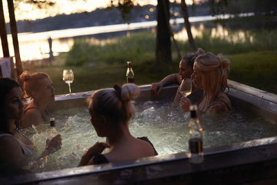 Female friends relaxing in hot tub