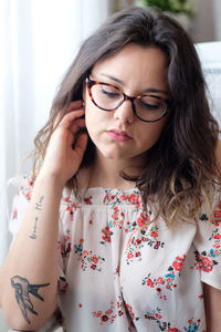 Close-up of thoughtful young woman