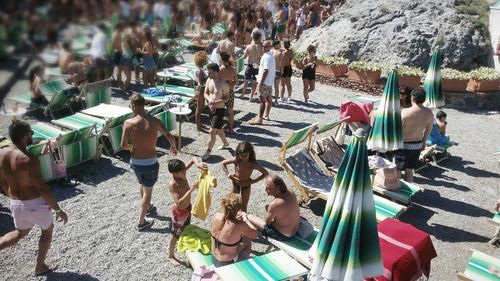 High angle view of people standing on street