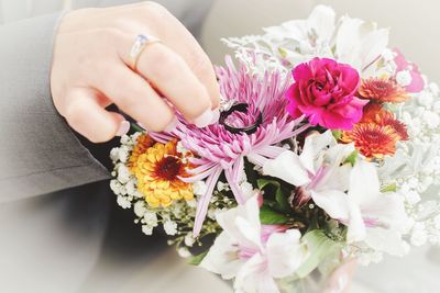 High angle view of woman holding bouquet