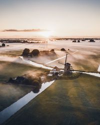 High angle view of sea against sky during sunrise