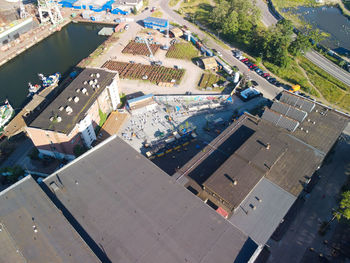 High angle view of swimming pool by city