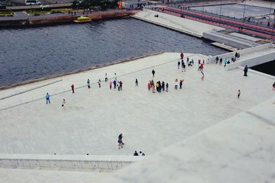 High angle view of people on road