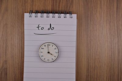 Close-up of clock on table