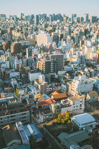 High angle view of buildings in city against clear sky