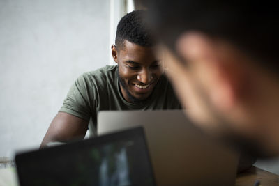 Young man using mobile phone