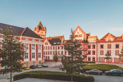 Buildings in city against sky