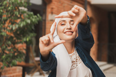 Portrait of smiling young woman