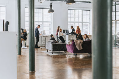 Multiracial business people working together at modern office