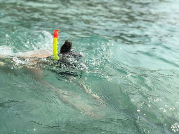 Man swimming in sea