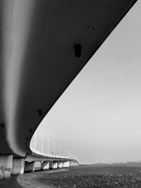 Bridge over river against clear sky