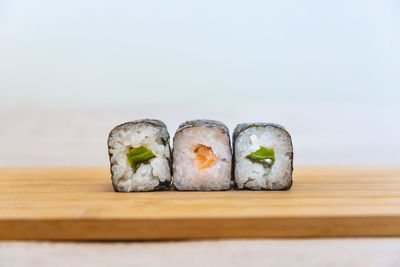 Close-up of sushi on serving board