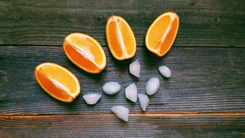 High angle view of orange fruits on table