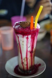 Close-up of drink served on table