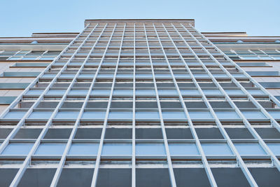 Low angle view of modern building against clear sky