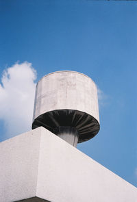 Low angle view of water tower against sky