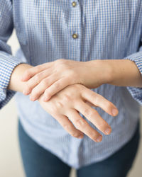 Close-up of man hand on finger