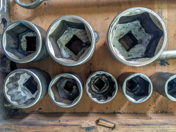 High angle view of old objects on table