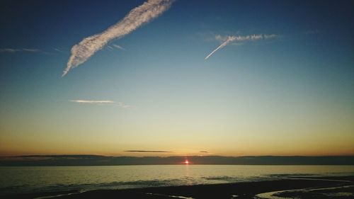 Scenic view of sea at sunset