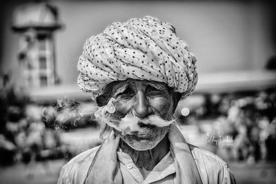 Portrait of man wearing hat outdoors