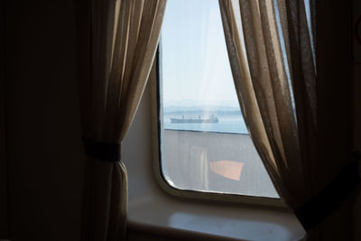 Sea seen through glass window