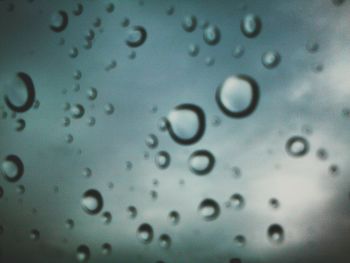 Close-up of water drops on glass