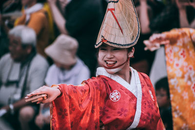 People in traditional clothing during festival